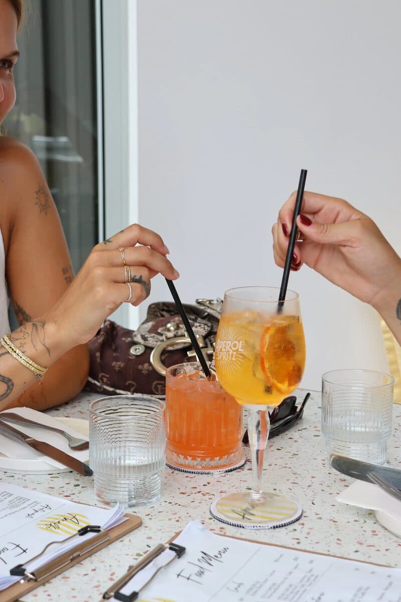 Friends toasting with cocktails