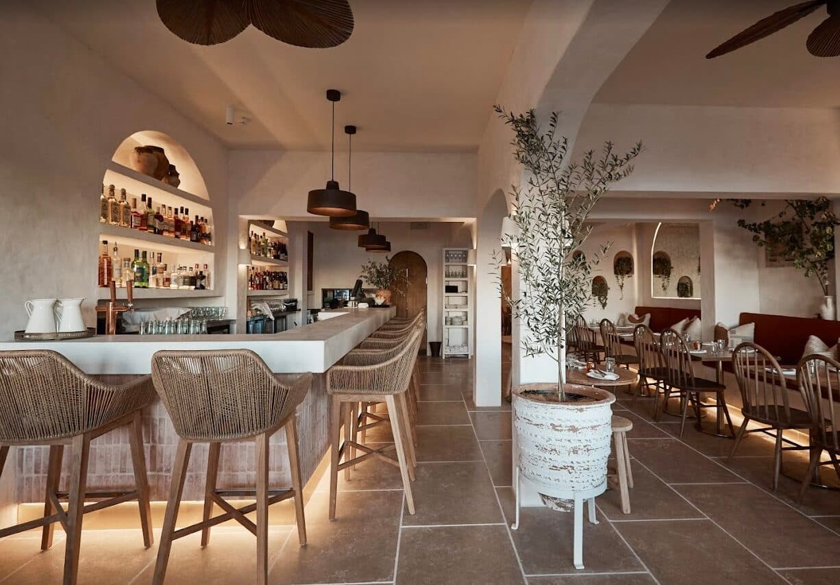 Bar interior with woven stools